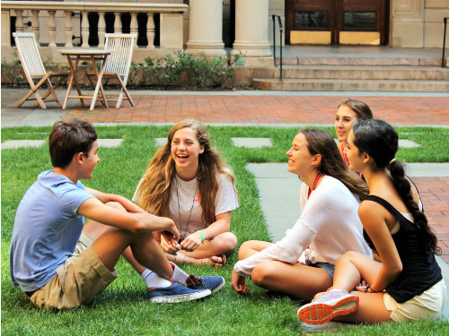 students on a lawn